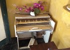 Very small piano, probably quite lovely when it worked.